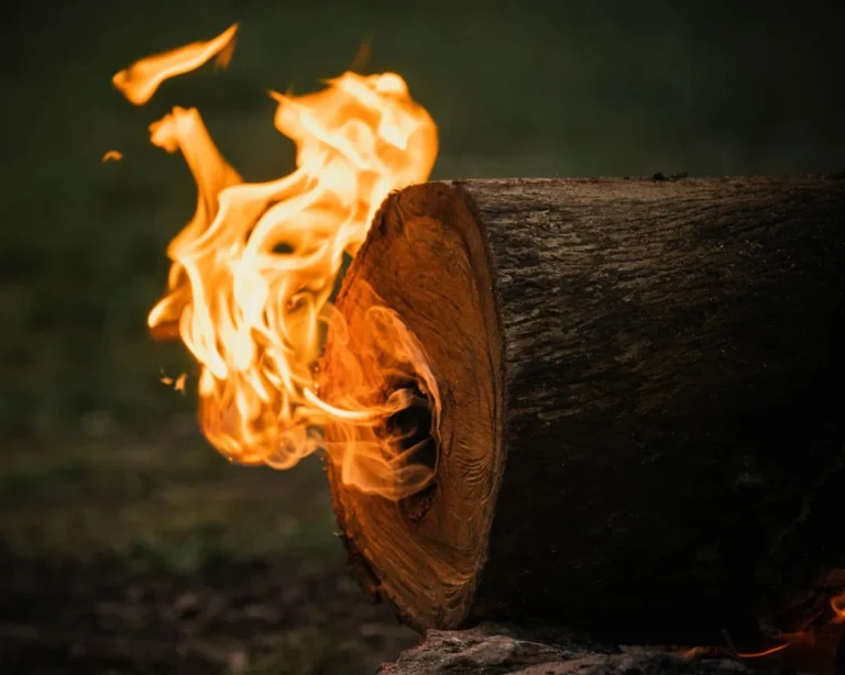 Swedish torch burning outdoors for heat and light