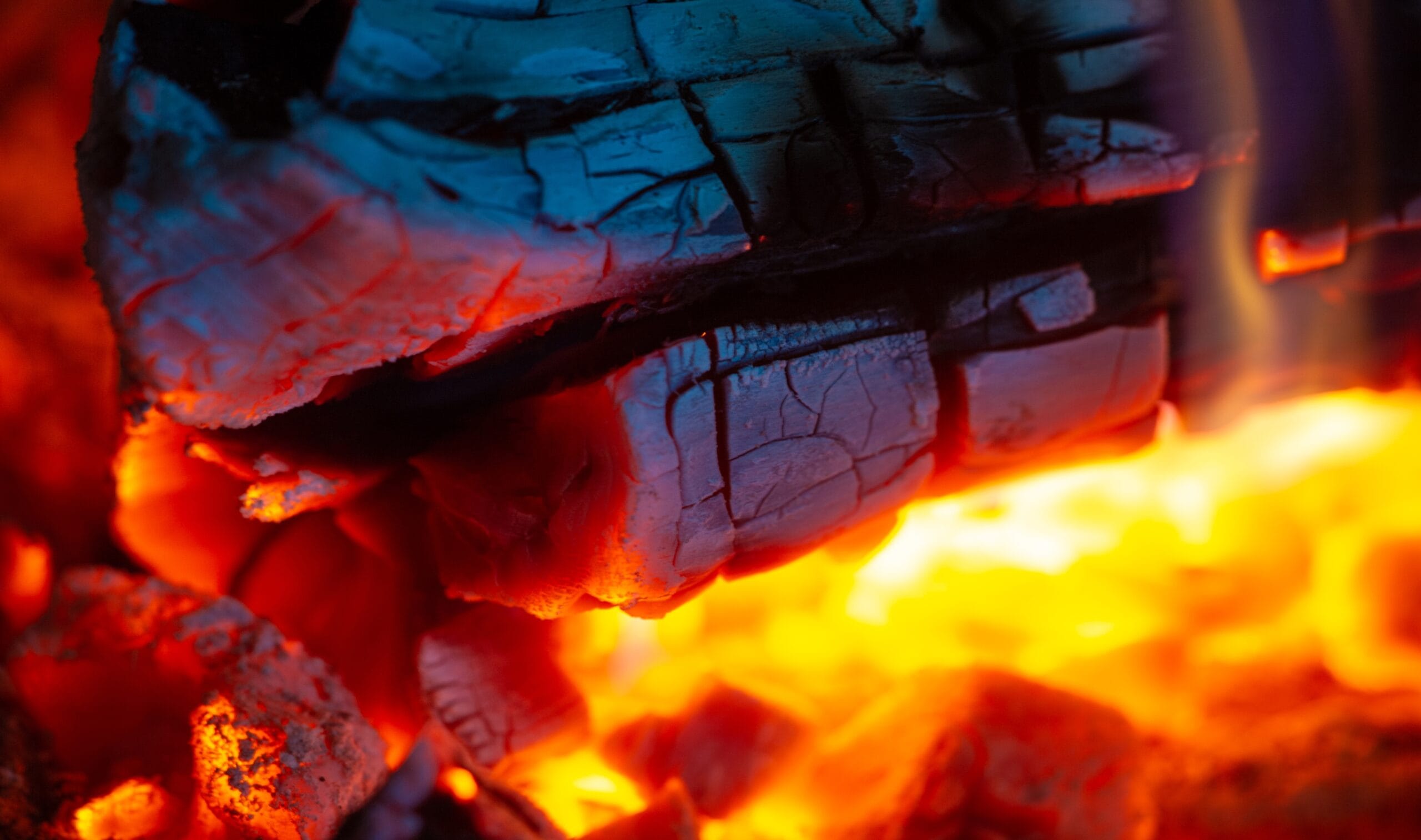 kiln dried logs burning in a fire